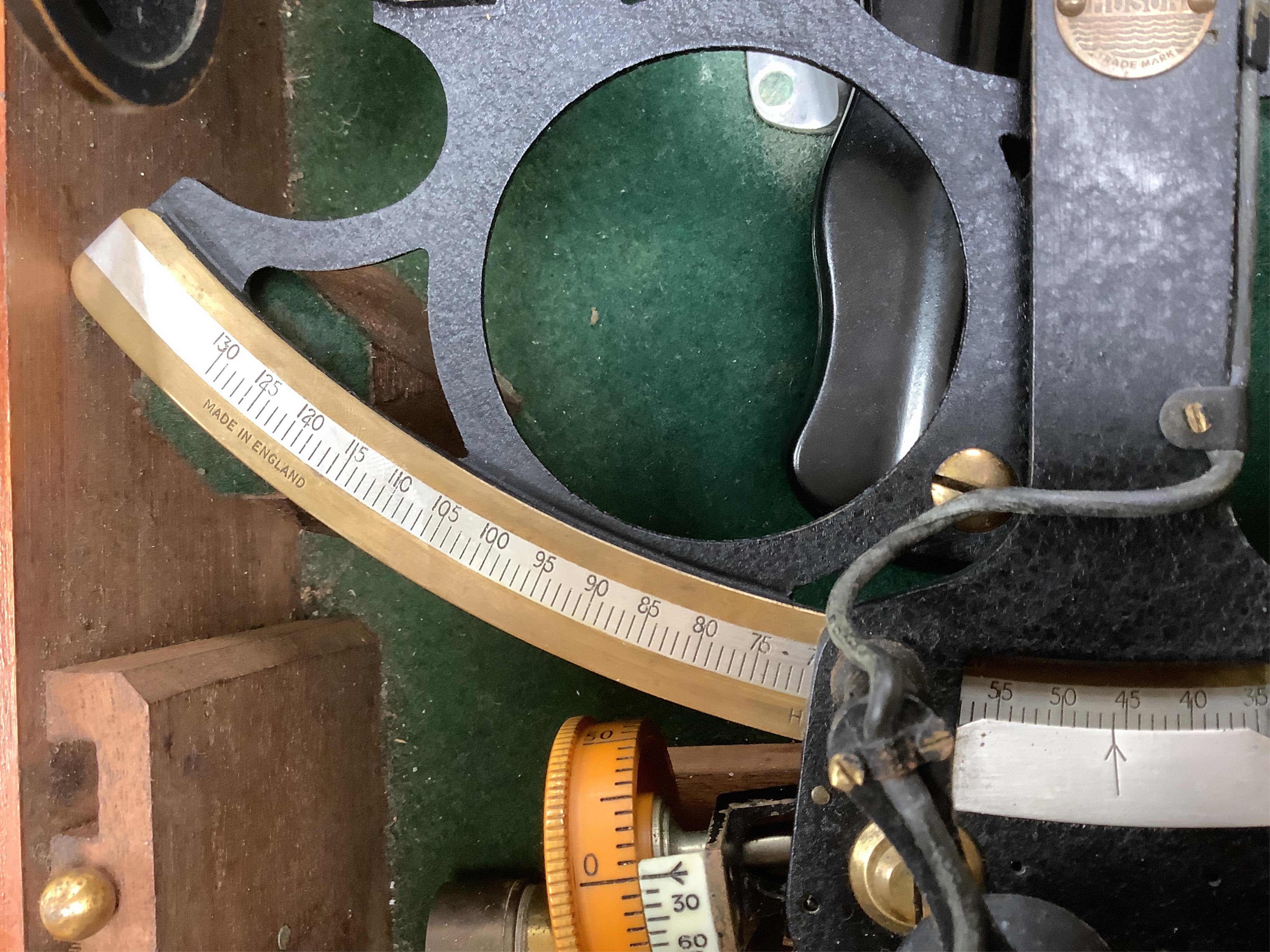 An early 20th century H. Hughes & Son Ltd. London, ‘Husun’ mahogany cased sextant, with engraved maker to the scale, also engrave serial number 29221, and with a battery pack for illuminating the scale, plaque to the ins